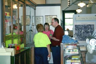 Todd and Jan Woelffer and Carol Strause trade memories of the old drug store and soda fountain.